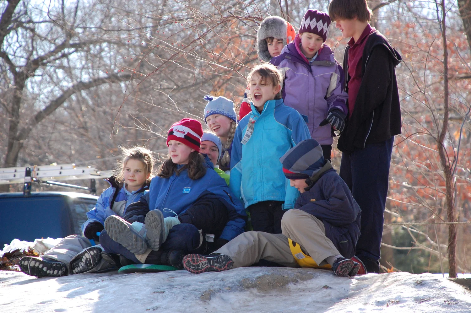 Students playing in the snow at recess at The Imago School in Maynard MA