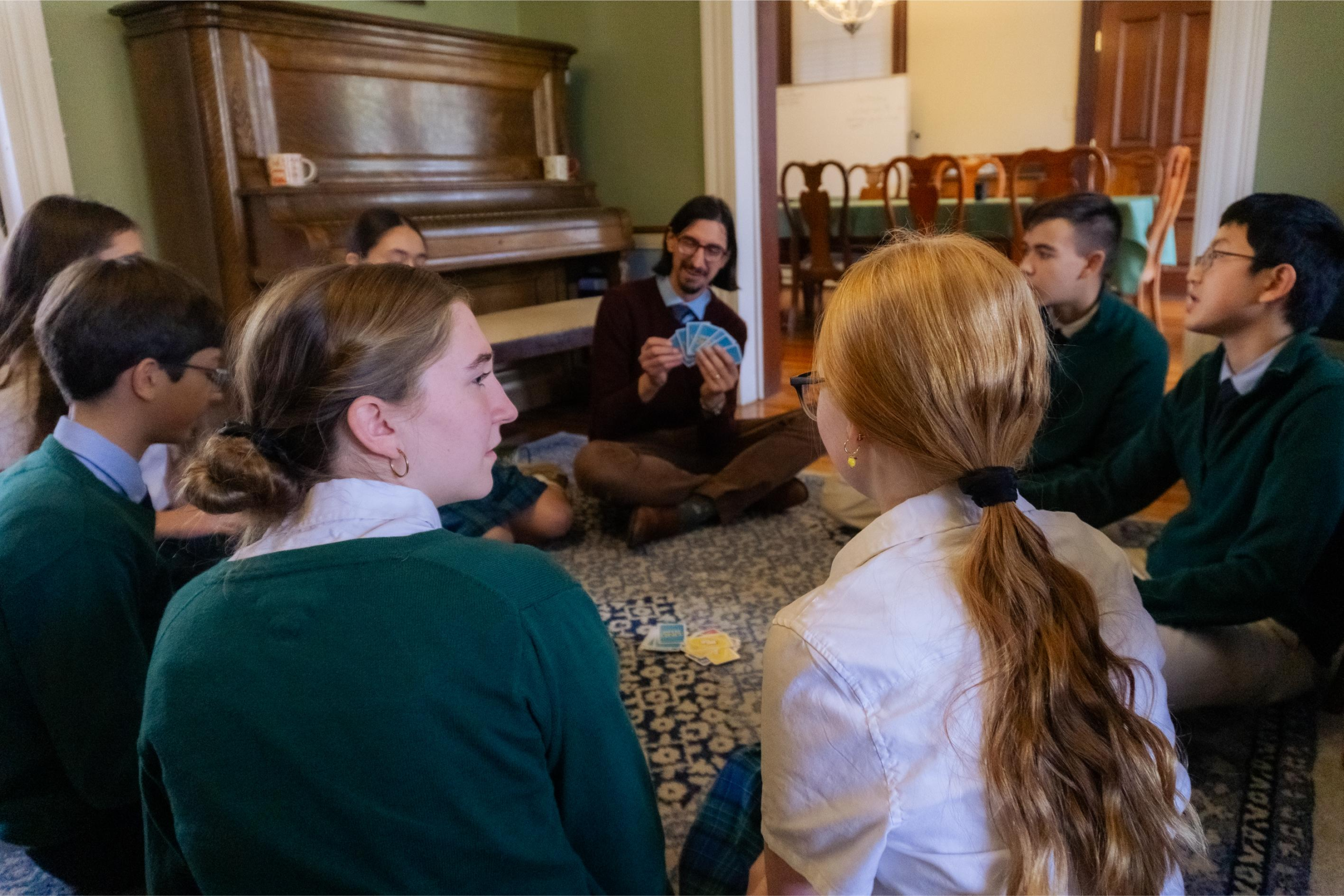 Students working at a desk at The Imago School in Maynard MA